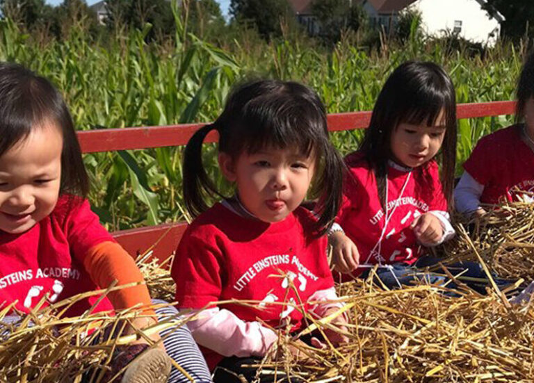 Children on a hayride at Johansen Farms